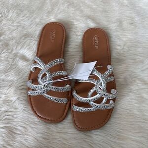Capelli of New York Silver and White Sandals with Crisscross Straps